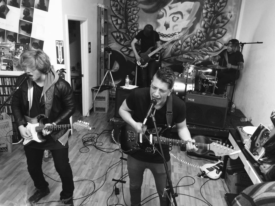Band playing in a small Olympia room